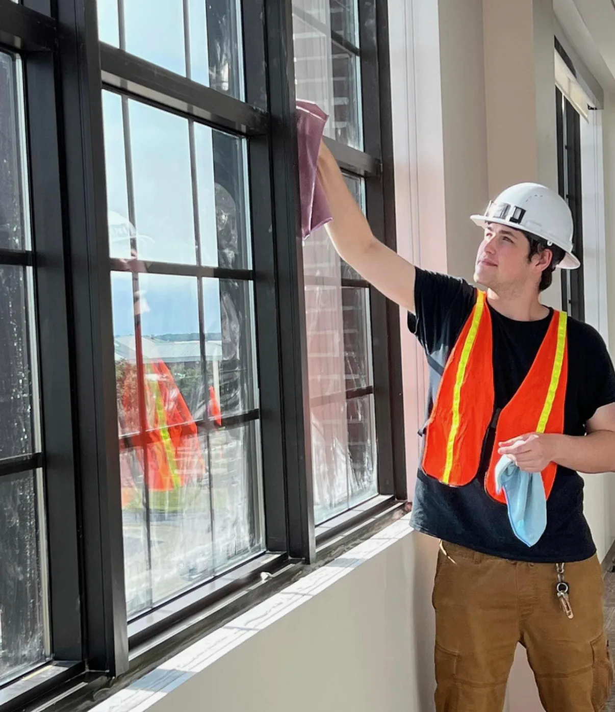 Professional window cleaning on a commercial building